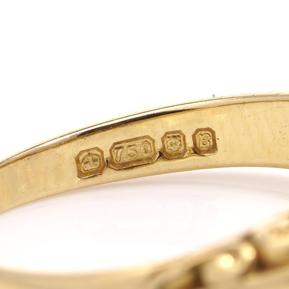 Three stone diamond ring in yellow gold