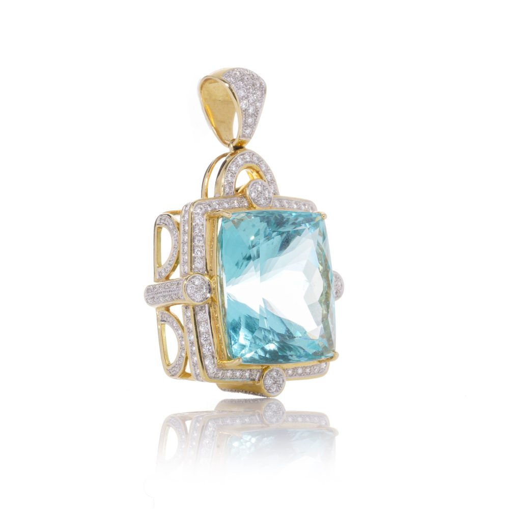 Gold pendant with aquamarine and diamonds.