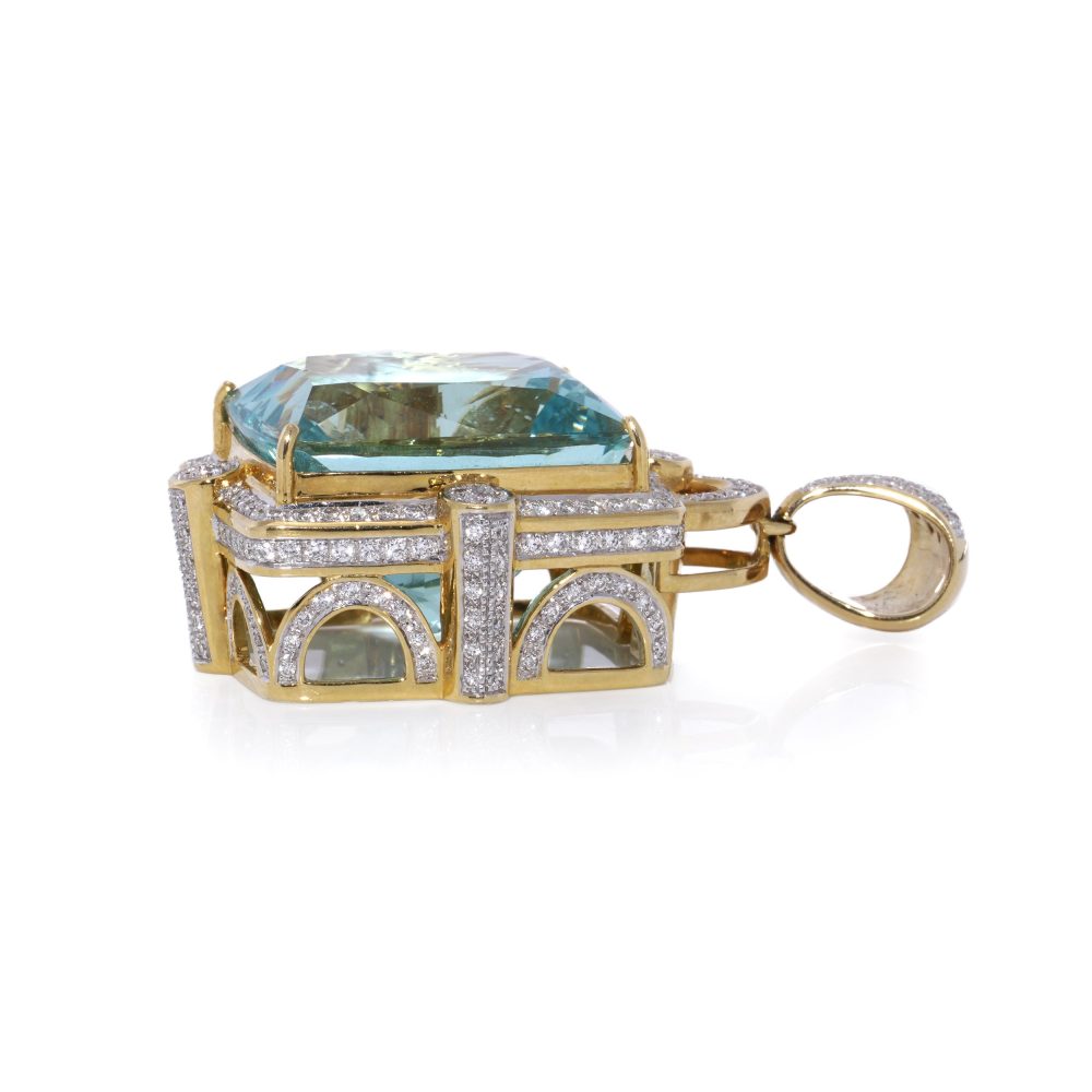 Gold pendant with aquamarine and diamonds.