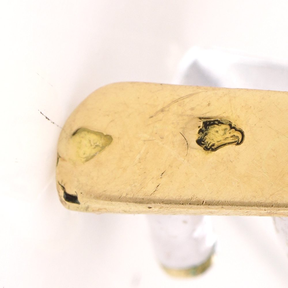 Jockey and horse brooch 18 carat gold and enamel.