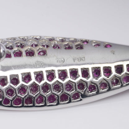 Vintage leaf-shaped brooch with rubies and diamonds in white gold.