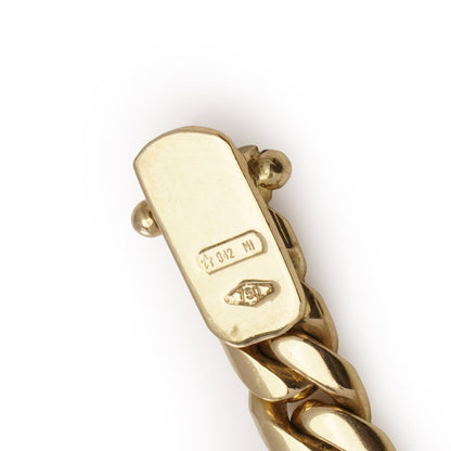 Theo Fennell gold and emerald necklace.