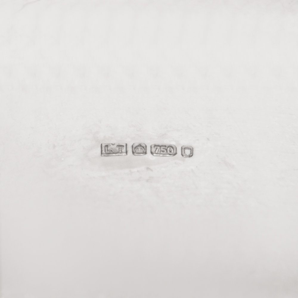 Extra wide band ring in white gold.