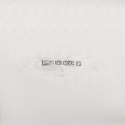 Extra wide band ring in white gold.