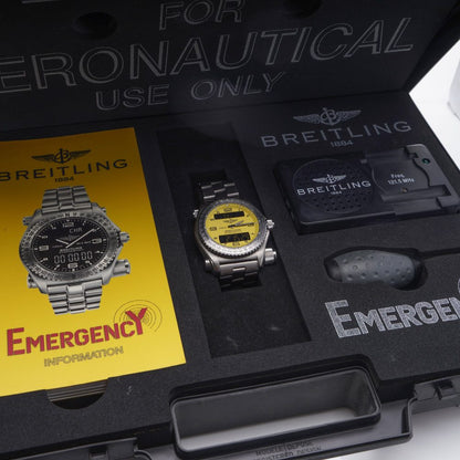 Breitling Emergency 43mm Titanium Quartz Watch Full Set with Box and Papers and service history from 1998. Titanium Case Yellow Dial Emergency Transmitter Original Breitling Briefcase marked "For Aeronautical Use Only." All Original Manuals and Documentation Emergency Information booklet Warranty User Manual