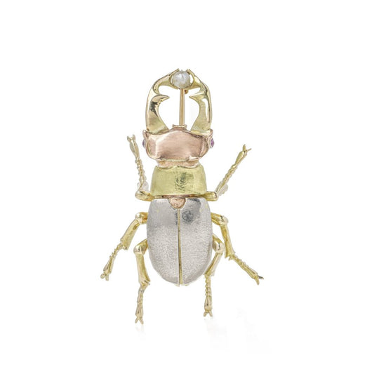 Vintage gold and platinum beetle brooch.