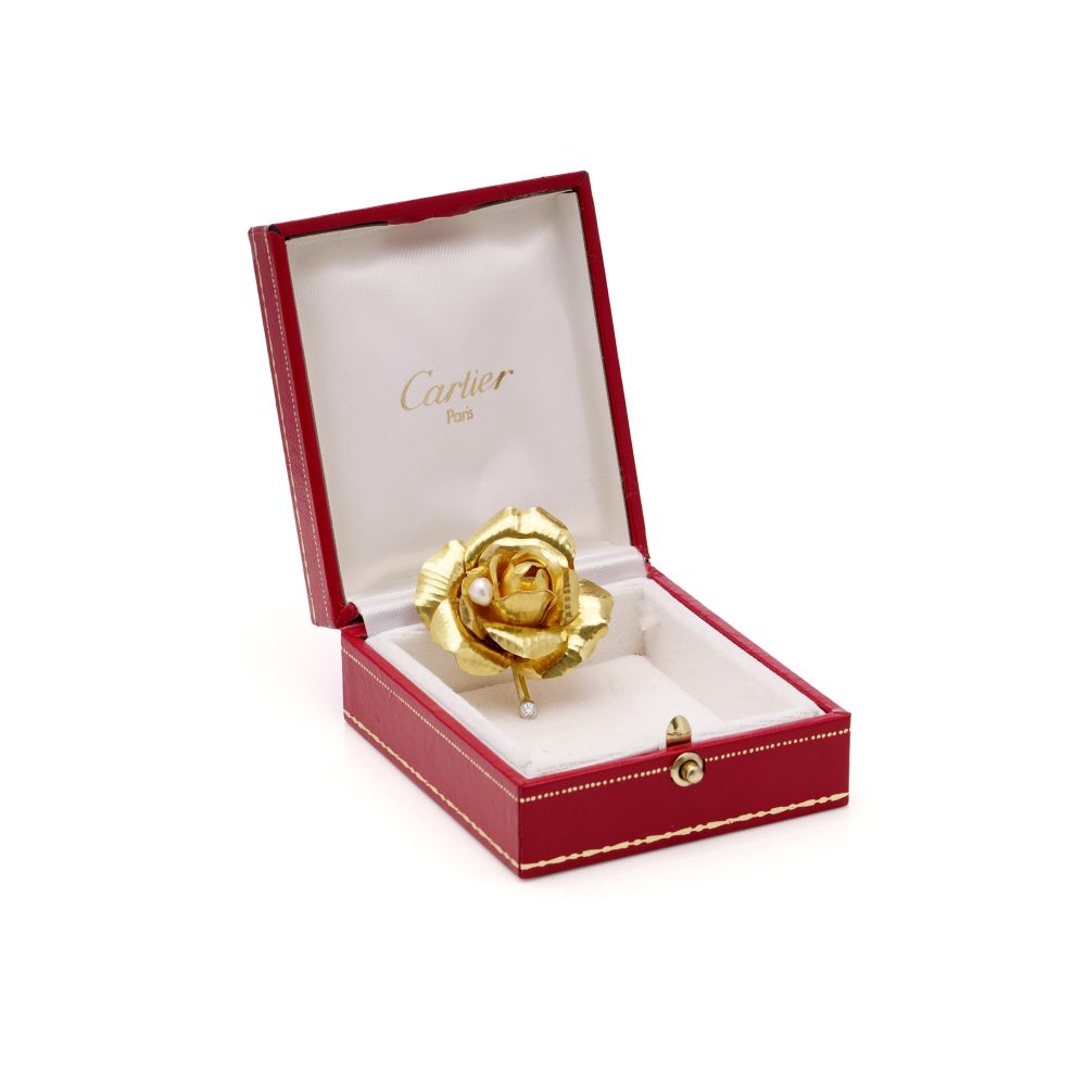 Cartier diamond and pearl rose brooch in gold.