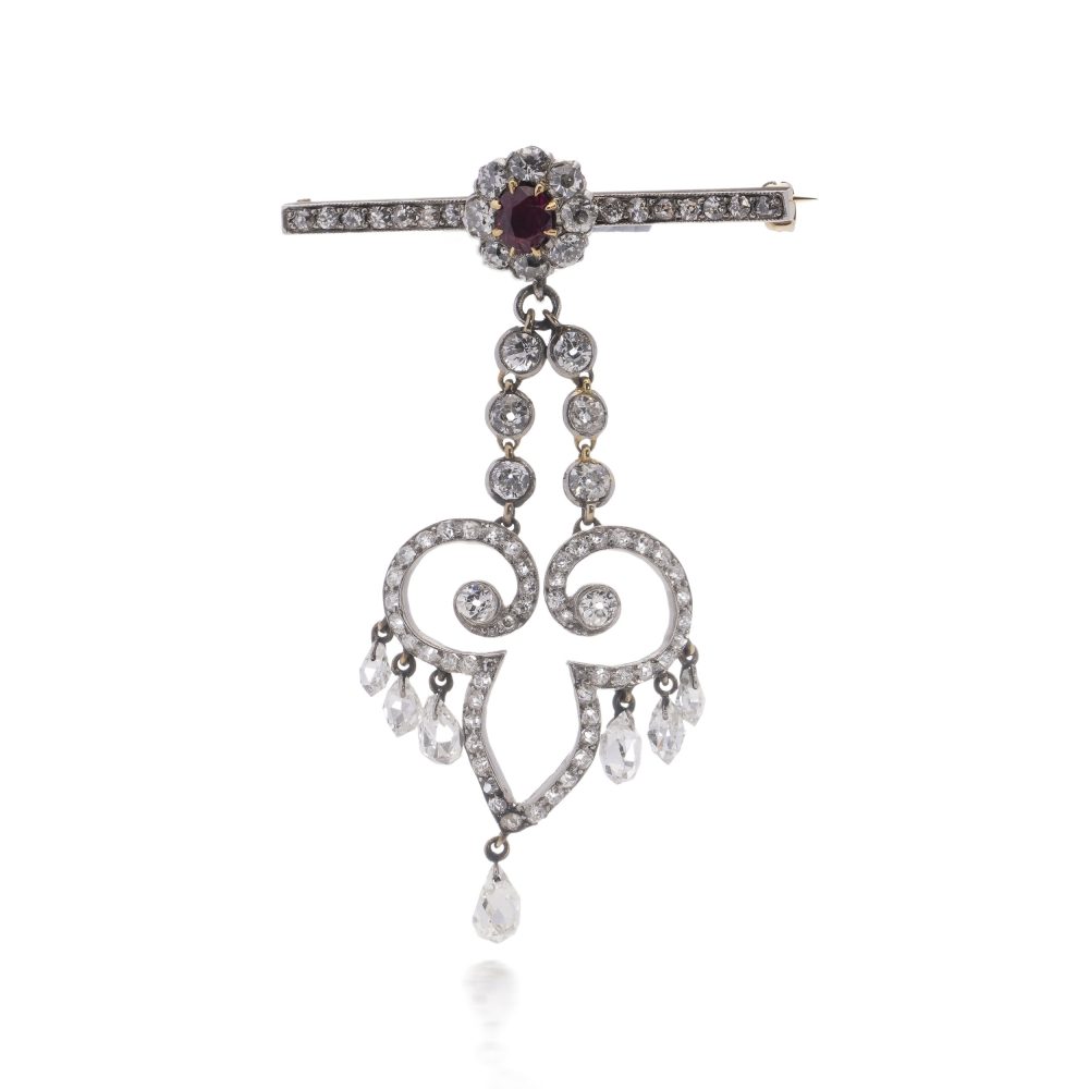 Antique gold bar brooch and pendant set with ruby and diamonds. Circa 1900's.