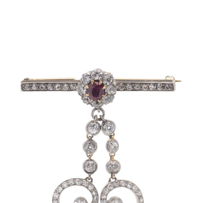 Antique gold bar brooch and pendant set with ruby and diamonds. Circa 1900's.