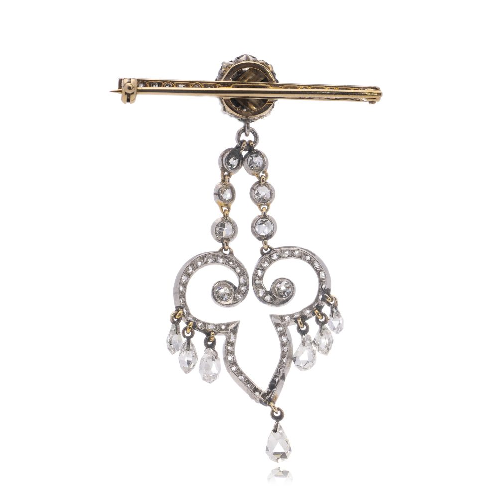 Antique gold bar brooch and pendant set with ruby and diamonds. Circa 1900's.