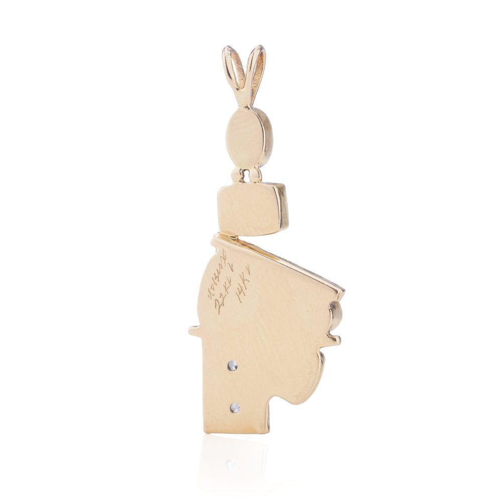 Gold pendant with opal, diamonds, emerald, amethyst, and pink spinel.