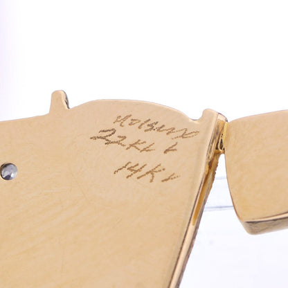 Gold pendant with opal, diamonds, emerald, amethyst, and pink spinel.