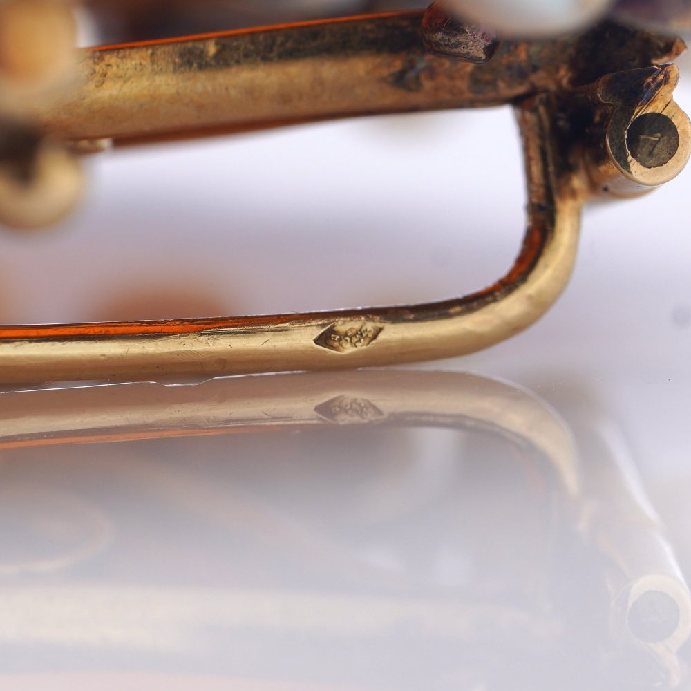 Victorian carnelian cameo diamond and pearl brooch in 18 carat gold.