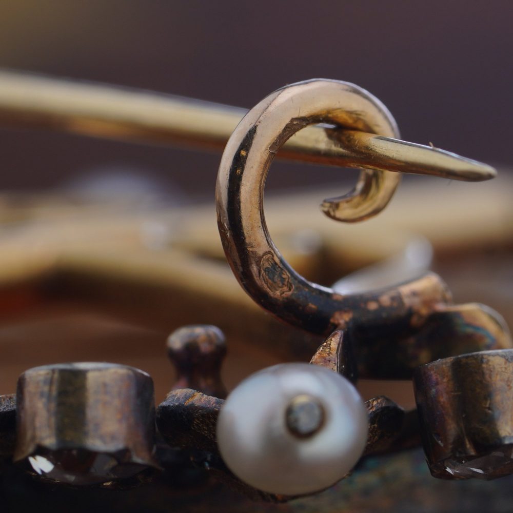 Victorian carnelian cameo diamond and pearl brooch in 18 carat gold.