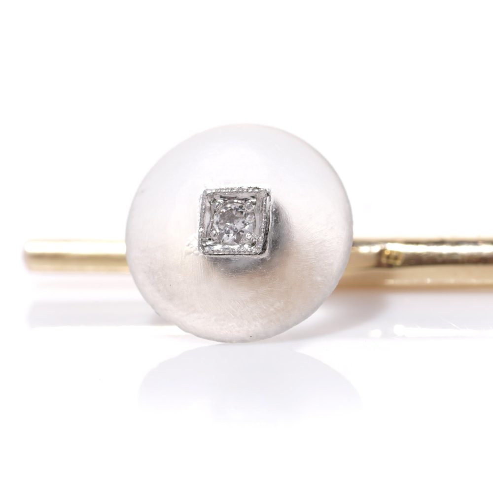 Cartier cufflinks and shirt studs in gold and platinum with rock crystals and diamonds.