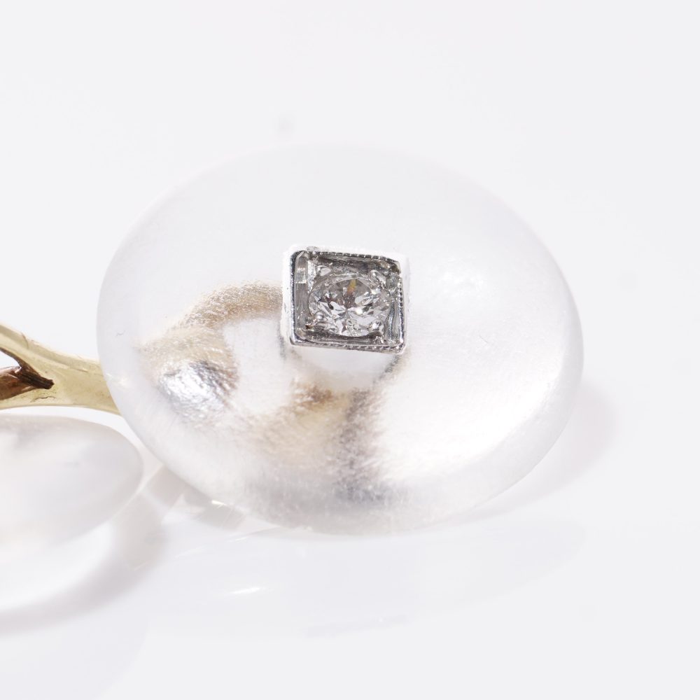 Cartier cufflinks and shirt studs in gold and platinum with rock crystals and diamonds.