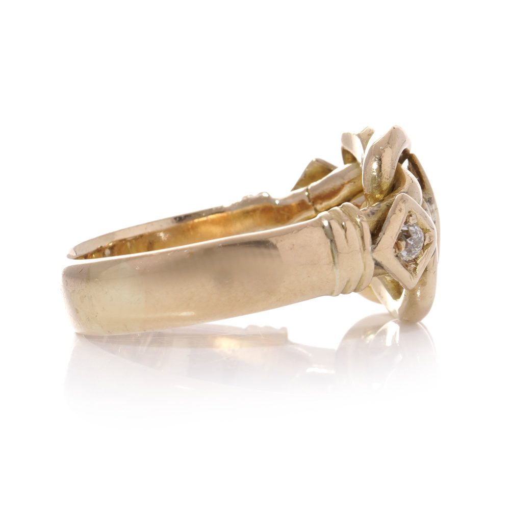 Vintage diamond and gold knot ring.