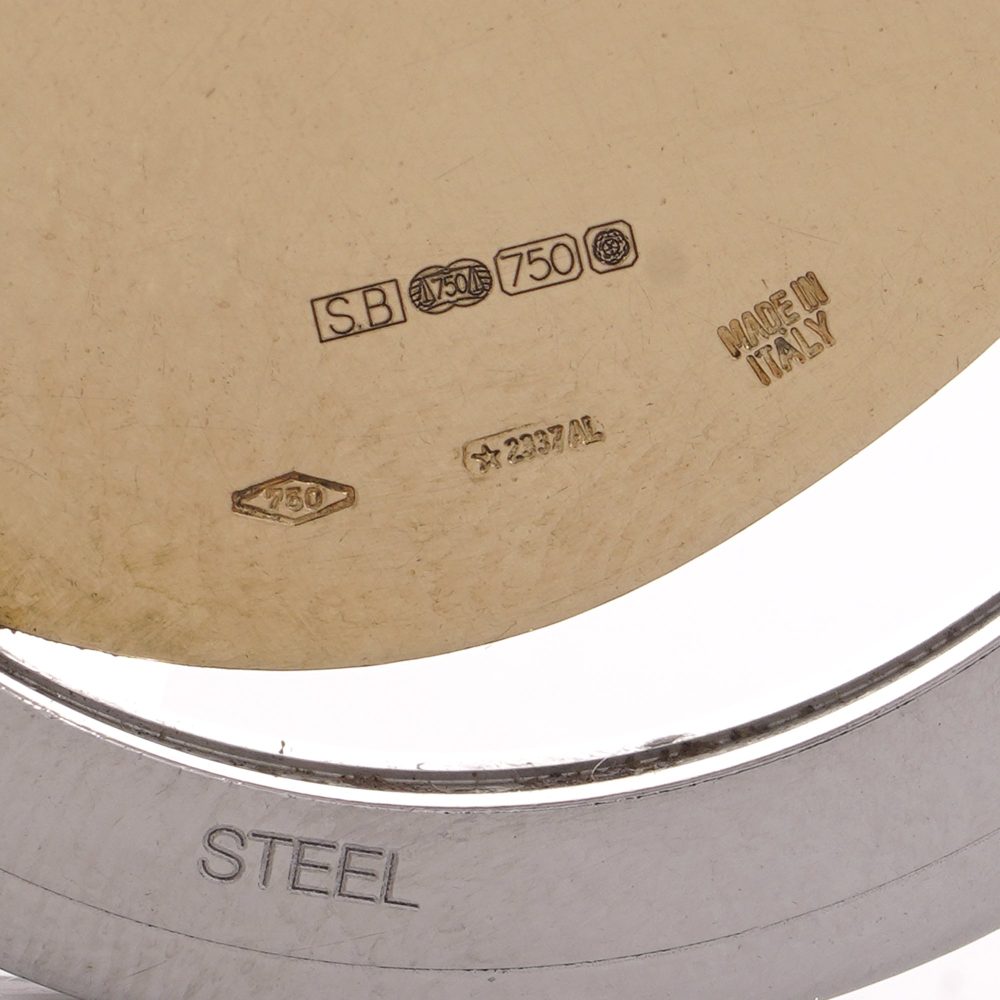 Bvlgari gold and stainless steel golden fish pendant.