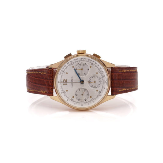 Vintage Eberhard 18ct Gold Mechanical Chronograph Watch, 35mm round gold case with white dial with three sub-dials and tachymeter scale, on brown leather strap. Circa 1950s