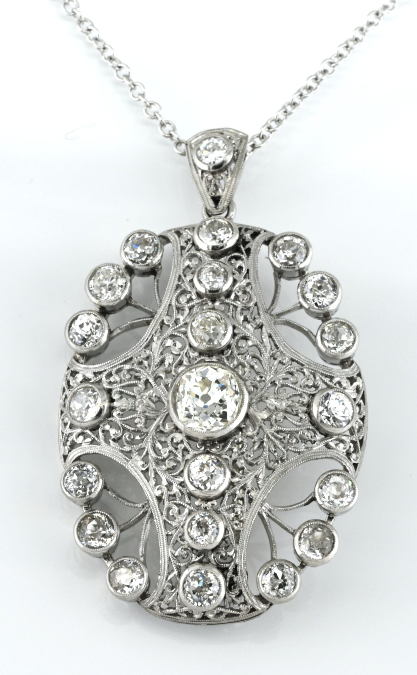 Edwardian Antique 8ct Old Mine Cut Diamond Pendant come Brooch in Platinum