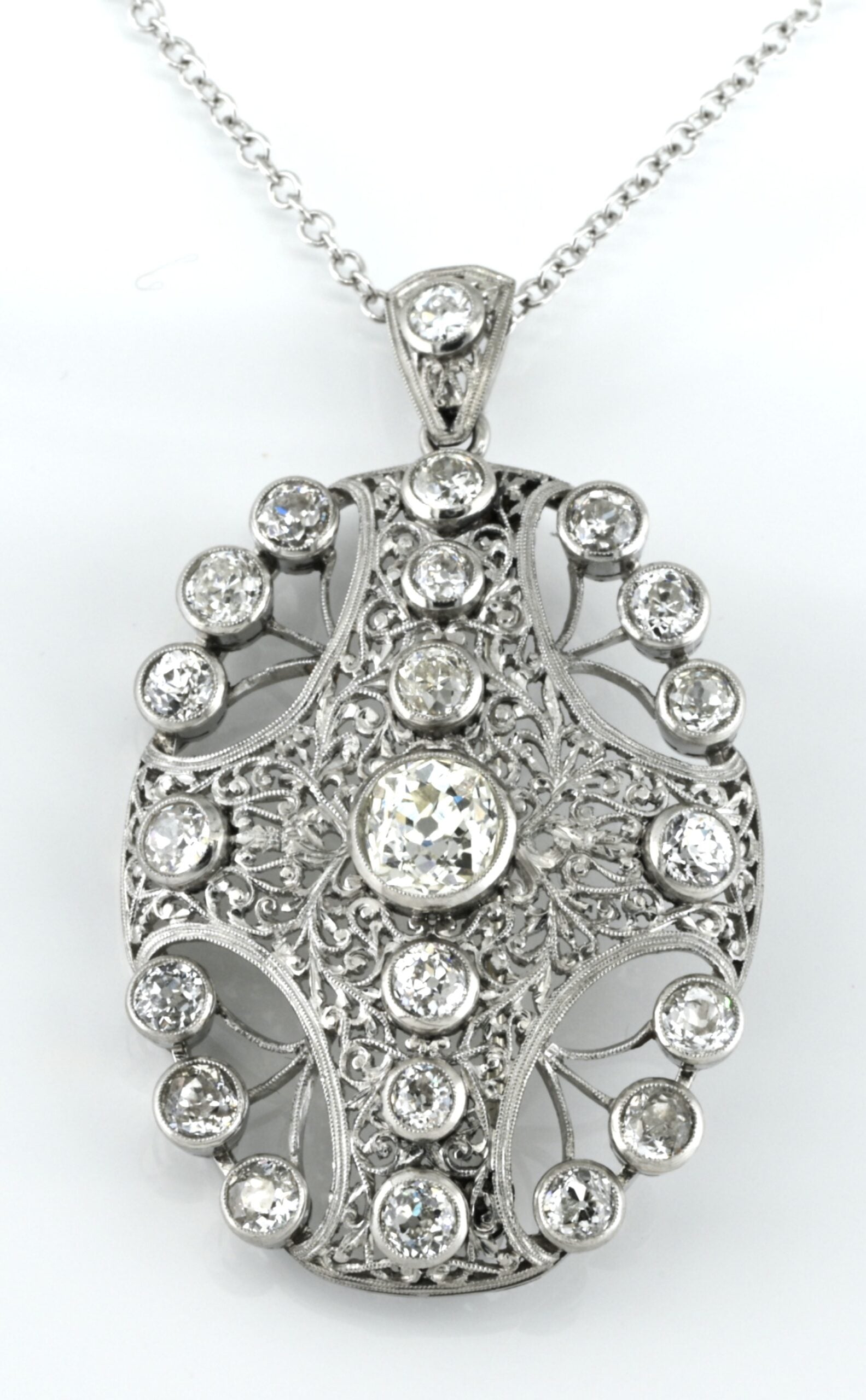 Edwardian Antique 8ct Old Mine Cut Diamond Pendant come Brooch in Platinum