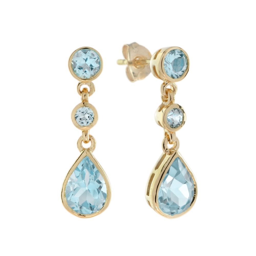 2.7ct Blue Topaz Pear Shaped Drop Earrings in 14ct Yellow Gold; featuring pear-shaped sky blue topaz suspended from two graduated round blue topaz with gold links between