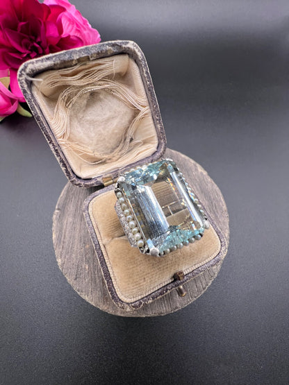 An aquamarine, pearl and diamond large cocktail ring in yellow gold and platinum, in a ring box