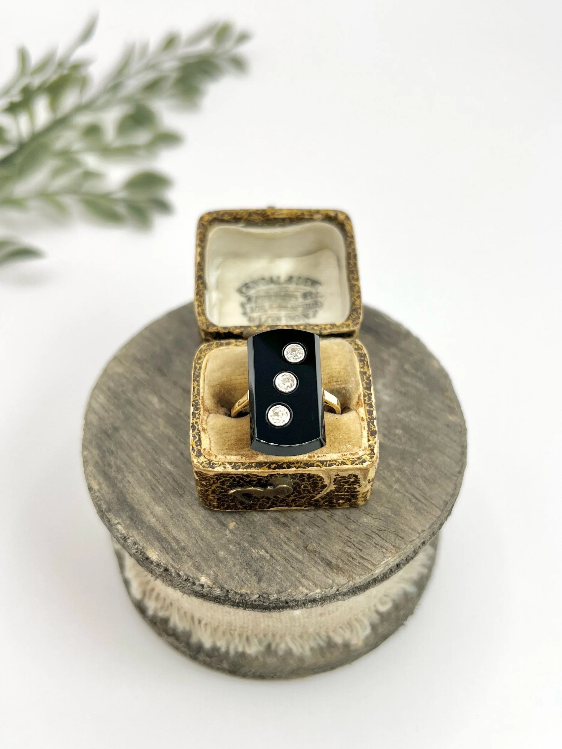 Art Deco 18 Carat Gold Rectangular Onyx and Diamond Three Stone Ring, Circa 1920