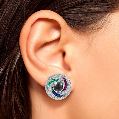 Black Diamond and Multi Gemstone Swirl Cluster Stud Earrings, round rose-cut black diamonds surrounded by French-cut rubies, sapphires and sparkling white round brilliant-cut diamonds in pin-wheel design in 14ct white gold