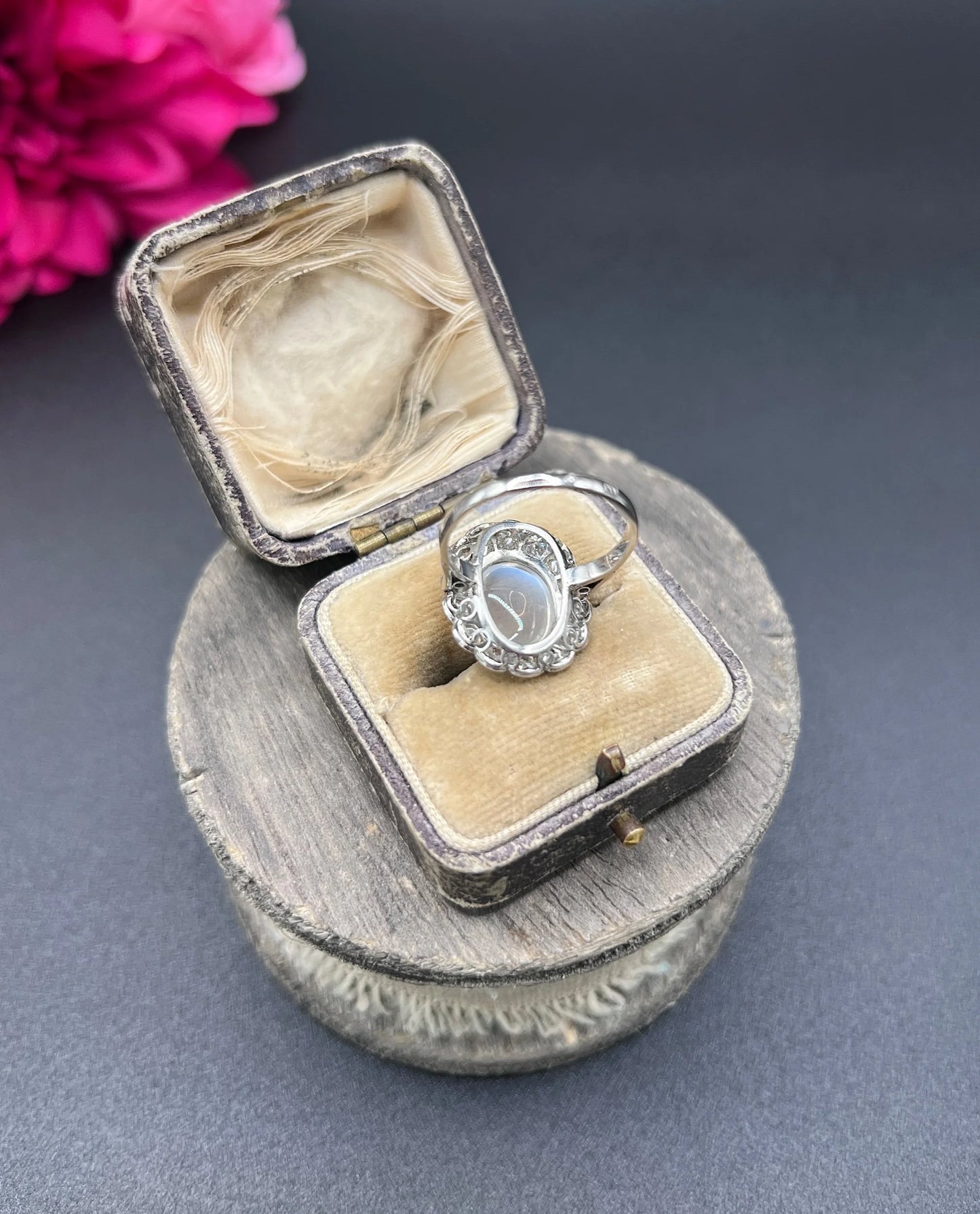 Antique French Platinum Cabochon Moonstone and Diamond Cluster Ring, Circa 1920