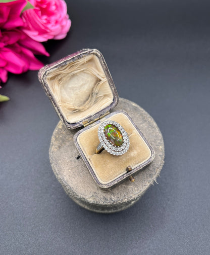 Vintage 18 Carat Gold, Platinum, Black Opal and Diamond Oval Cluster Ring