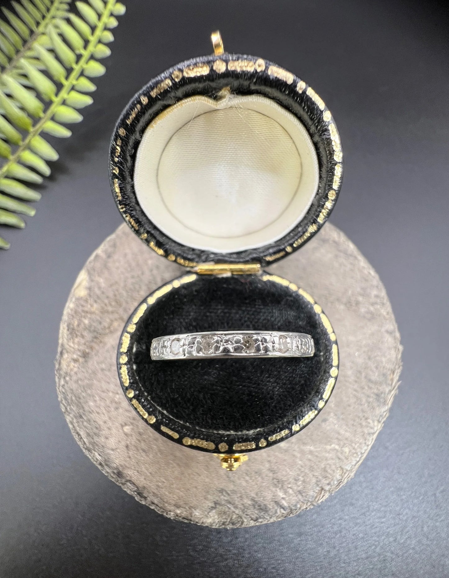 A diamond full eternity ring in white gold, in a ring box