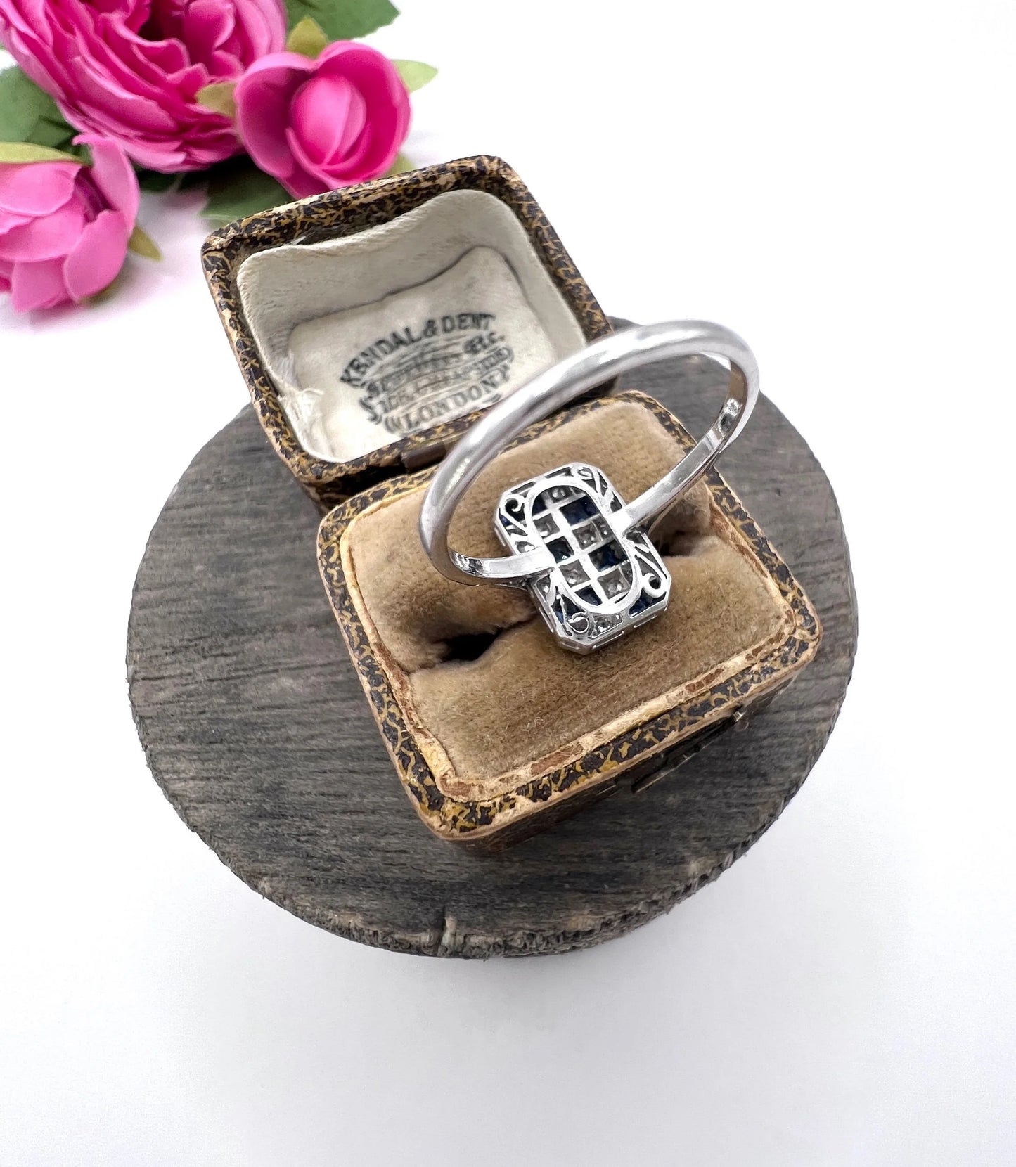 A sapphire and diamond tablet style ring in platinum