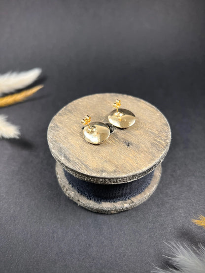 A pair of yellow gold oval earrings