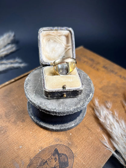 A yellow gold blue glass intaglio signet ring, in a ring box