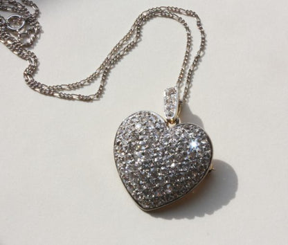 Antique Edwardian Cushion Cut Diamond Set Heart Pendant; 4.00 carat total, in platinum with gold backing, with platinum chain, can also be worn as a brooch