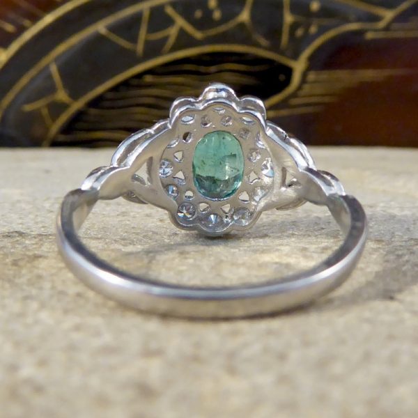Edwardian Style Emerald and Diamond Oval Cluster Platinum Ring