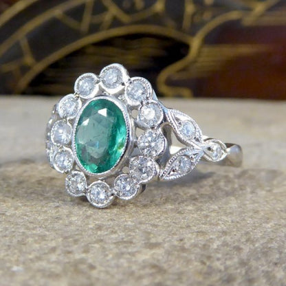 Edwardian Style Emerald and Diamond Oval Cluster Platinum Ring
