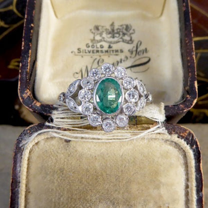 Edwardian Style Emerald and Diamond Oval Cluster Platinum Ring