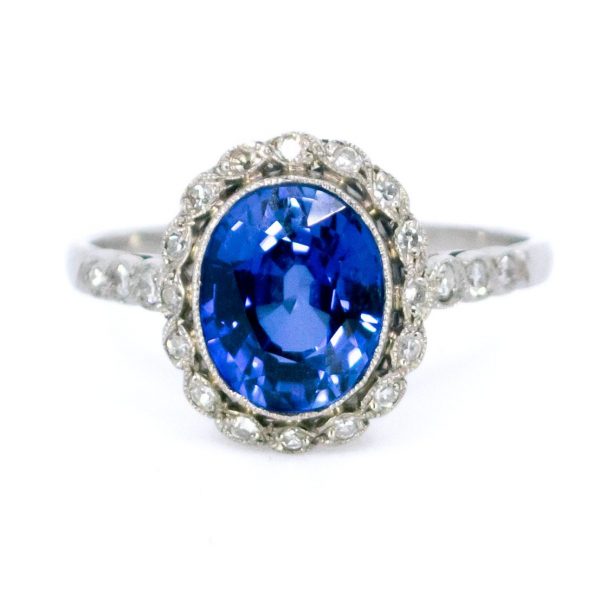 Edwardian Style Tanzanite and Diamond Cluster Ring
