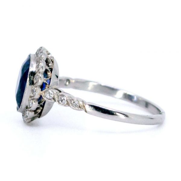 Edwardian Style Tanzanite and Diamond Cluster Ring