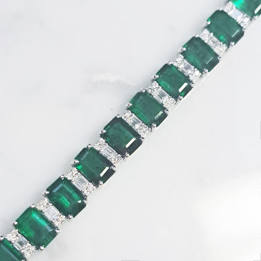 14.15ct Emerald Cut Emerald and Diamond Line Tennis Bracelet