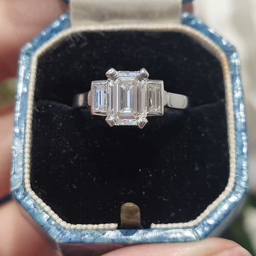 Art Deco 1.51ct Emerald Cut Diamond Trilogy Engagement Ring, certified 1.55ct I colour VS2 clarity emerald-cut diamond flanked by baguette-cut diamonds in platinum