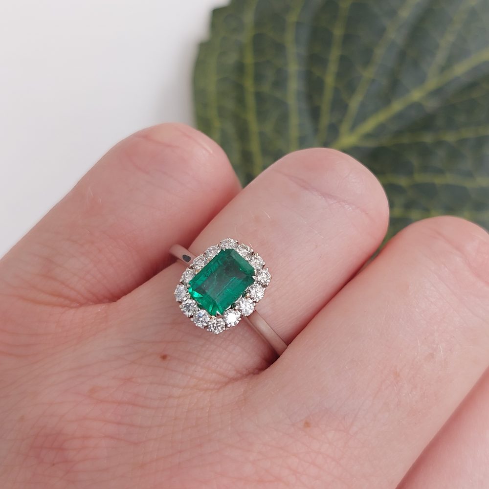 Emerald Cut Emerald and Diamond Cluster Ring in 18ct Gold, 1.13 carats