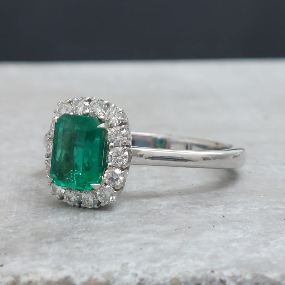 Emerald Cut Emerald and Diamond Cluster Ring in 18ct Gold, 1.13 carats