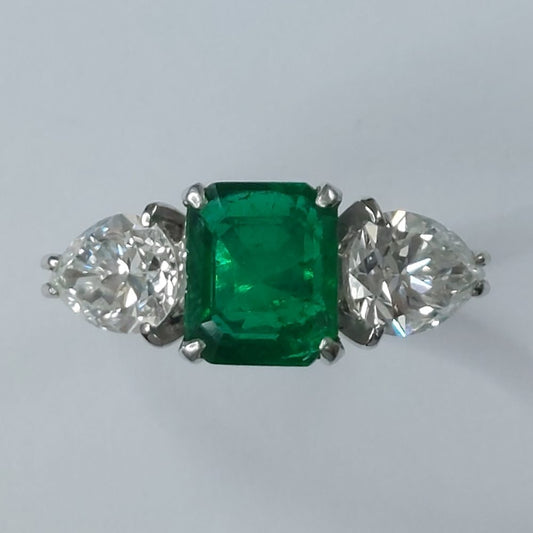 Emerald and Pear Shaped Diamond Three Stone Ring