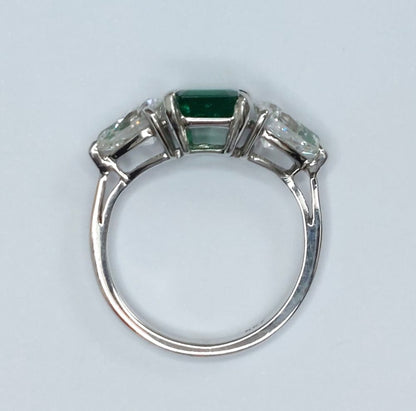 Emerald and Pear Shaped Diamond Three Stone Ring