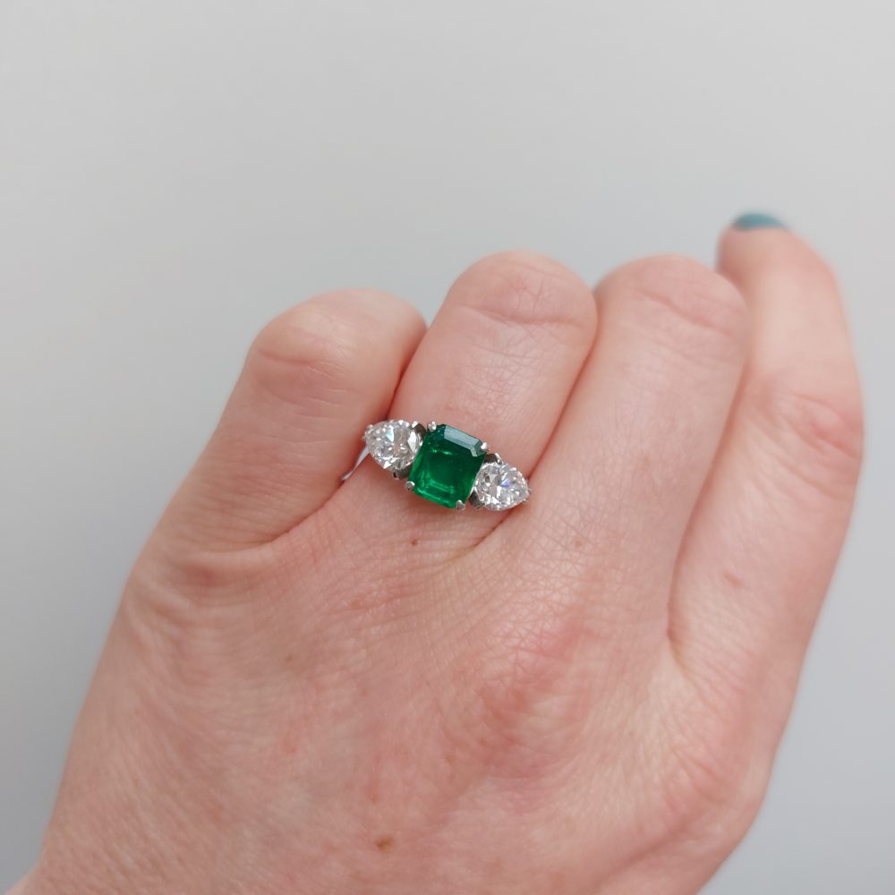 Emerald and Pear Shaped Diamond Three Stone Ring