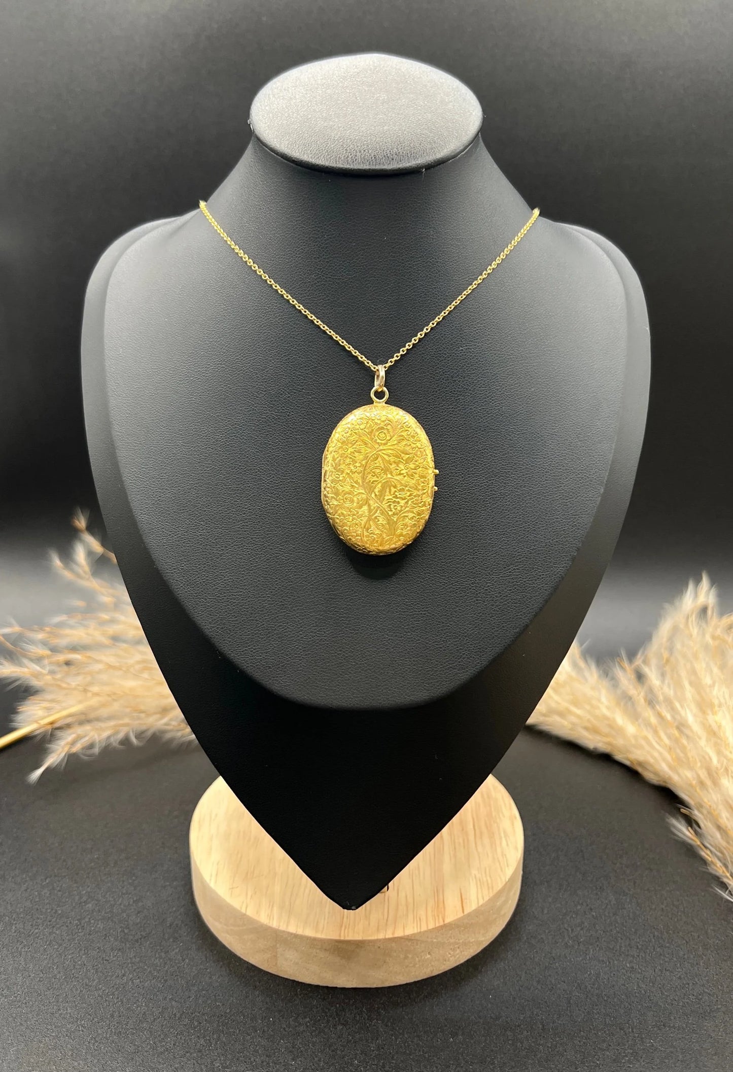 Victorian 18 Carat Yellow Gold Floral Engraved Oval Shaped Locket, Circa 1880