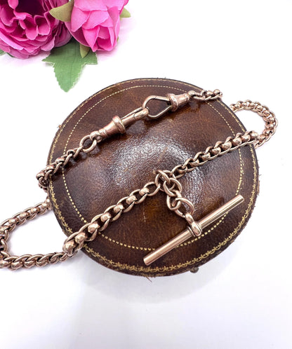 A rose gold fancy link Albert chain necklace with a T-bar attachment
